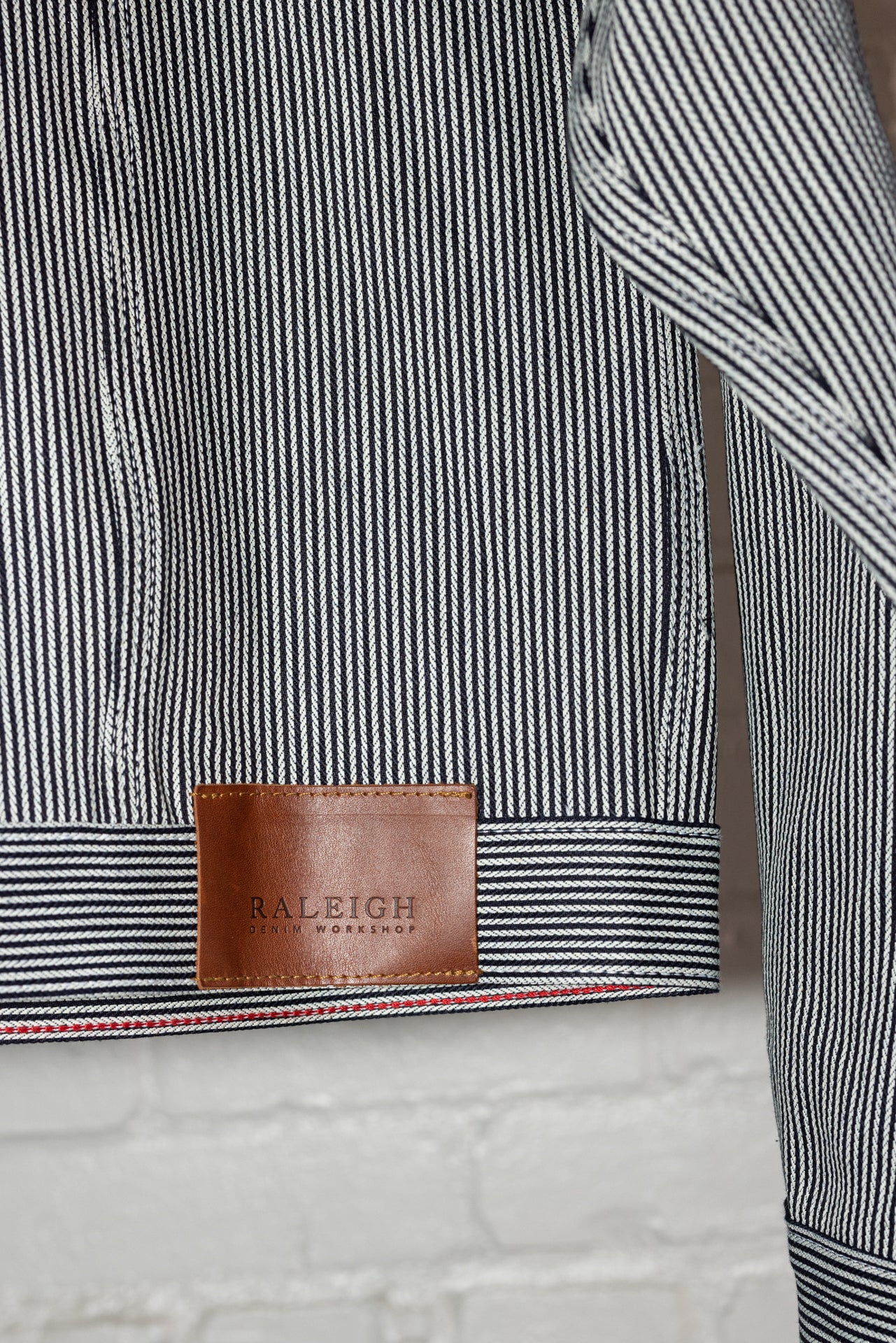 angle: Denim Jacket Railroad Stripe | Raleigh Workshop denim jacket in a black and white railroad stripe