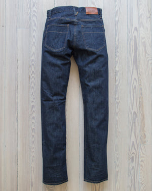 angle: resin rinse | Raleigh Denim Workshop Alexander work fit jeans with a dark wash, front view